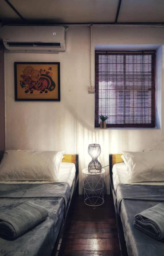 Treehouse Hostel กูชิง ภายนอก รูปภาพ